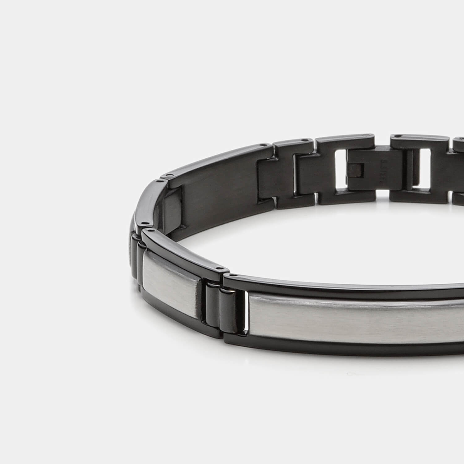 Gesamtansicht eines edlen, schwarz-silbernen Gliederarmbandes aus antiallergenem Edelstahl von MONOMANIA.