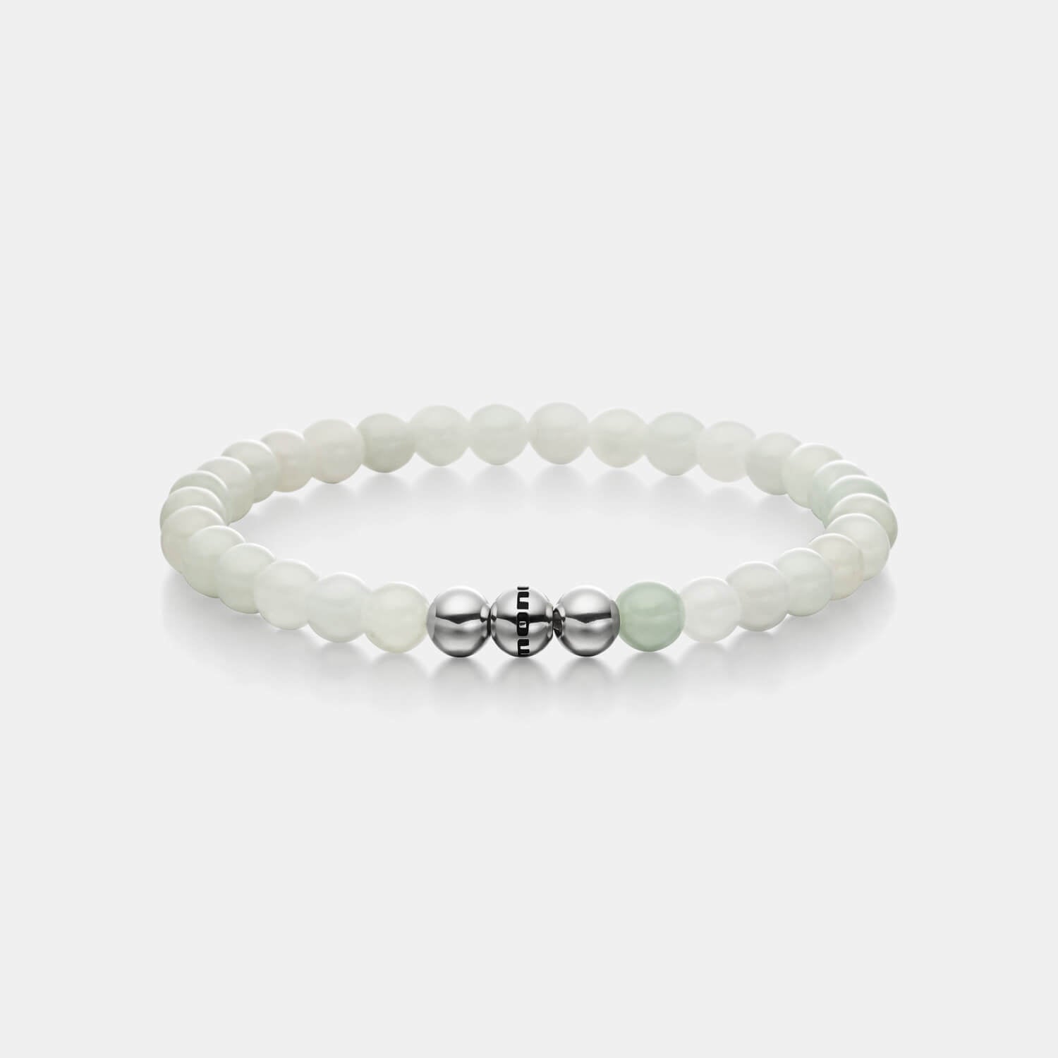 Gesamtansicht eines Perlenarmbandes aus hellgrünen Jade-Perlen von MONOMANIA.