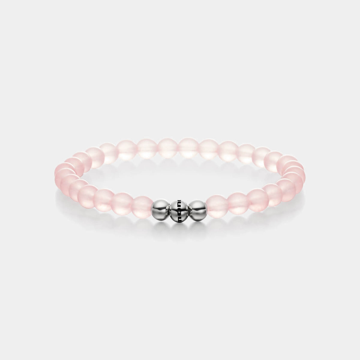 Gesamtansicht eines rosanen Perlenarmbandes aus echtem Rosenquarz mit drei antiallergenen Edelstahlperlen.(105 Zeichen inkl L) gut so