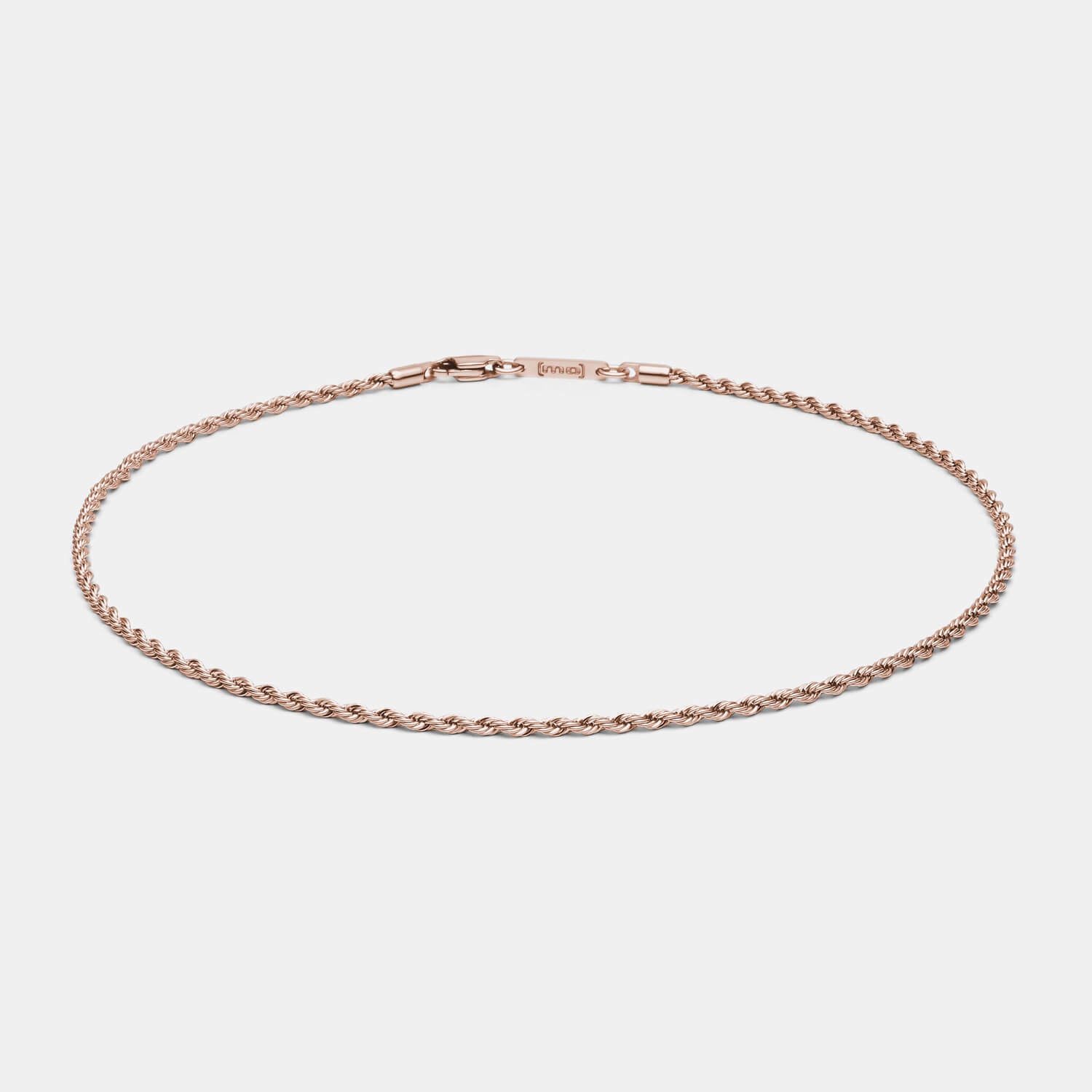 Detailansicht einer roségoldfarbenen Kordelkette aus antiallergenem Edelstahl mit Karabinerverschluss von MONOMANIA.