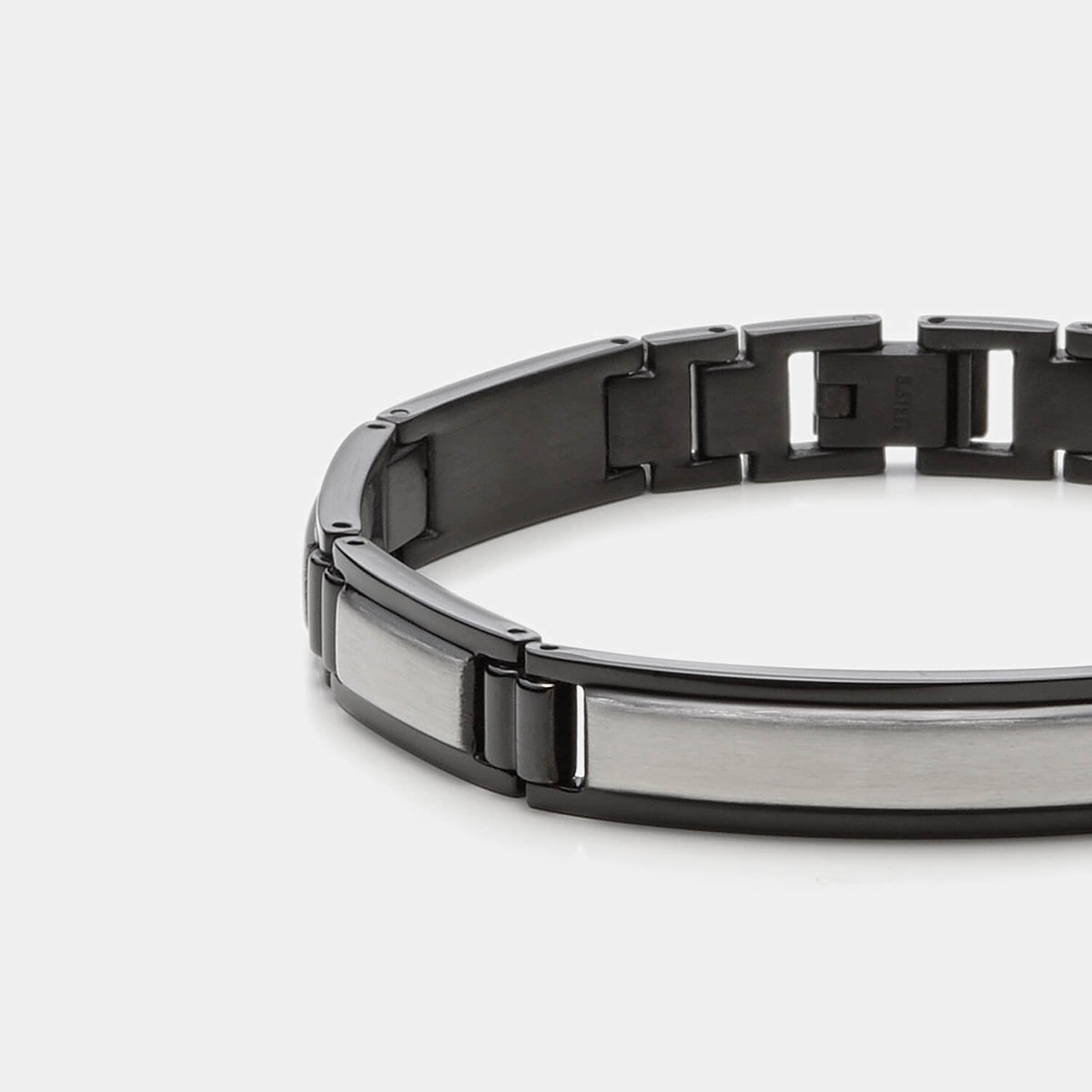 Gesamtansicht eines edlen, schwarz-silbernen Gliederarmbandes aus antiallergenem Edelstahl von MONOMANIA.