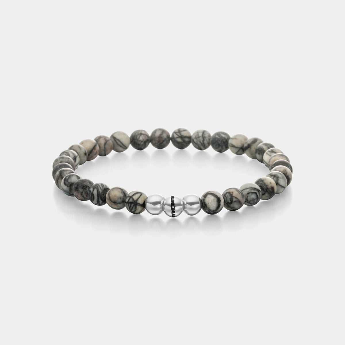 Gesamtansicht eines  Perlenarmbandes aus echten grauen Basalt-Perlen mit drei antiallergenen Edelstahlperlen.